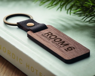 Logotrade firmakingi foto: Võtmehoidja pähklist ja PU-st Kokkola